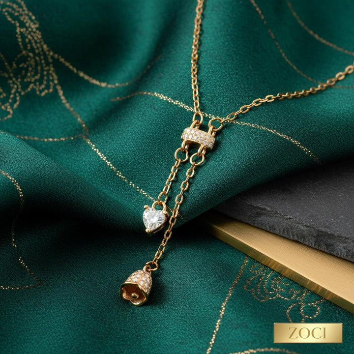 Gold Paved Heart Bell Lariat