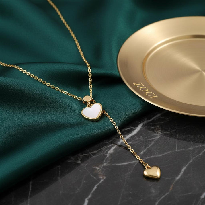Gold Tone White Heart Lariat