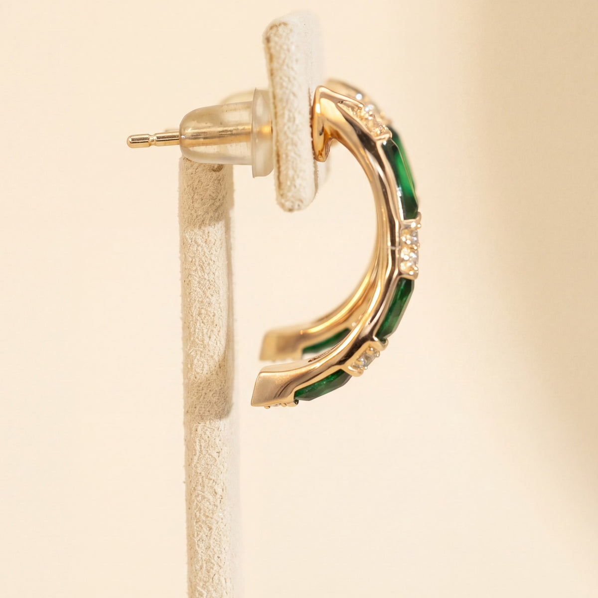 Side profile of the leopard hoop showing the curve, post and push-back
