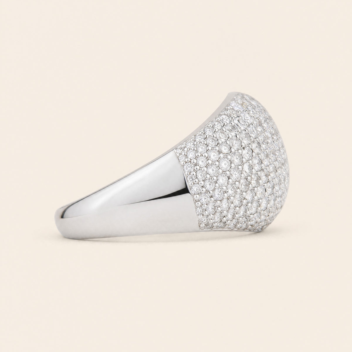 Pavé dome ring, side profile showing the pavé top rising from the polished band